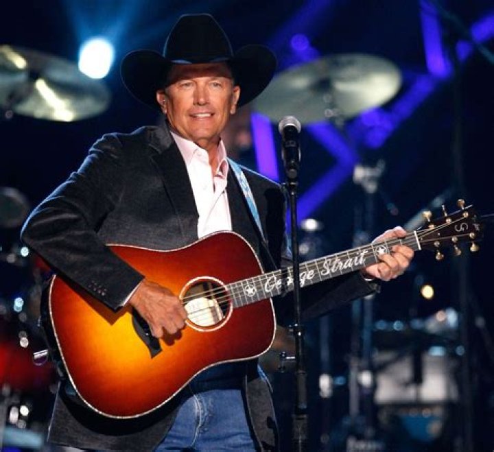 George Strait performing on the stage.